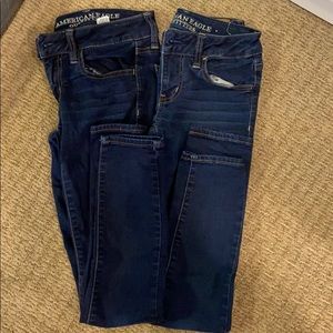 2 dark wash American eagle super stretch jeggings